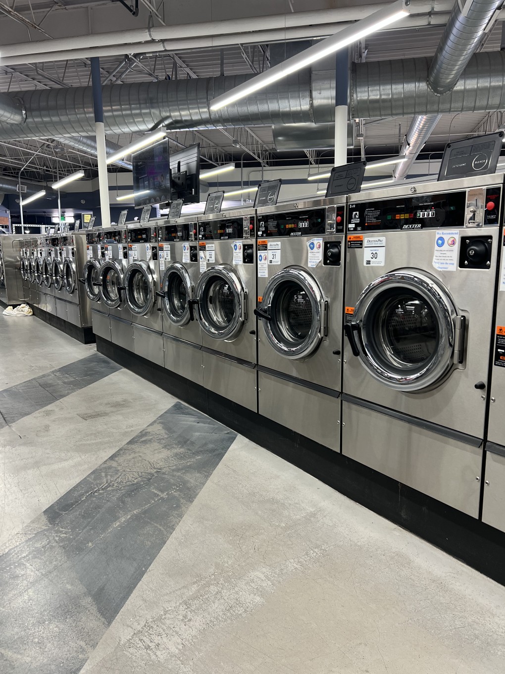 Commercial linen and uniform laundry service at Laundry Lounge on E Pikes Peak Ave
